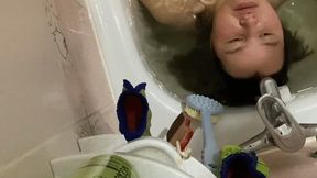 Diving in bathtub hholding breath