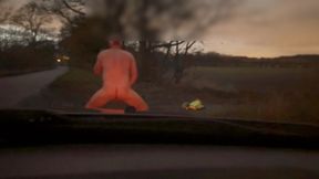 Leaving the car in just a long coat and been naked between passing cars