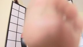Italian mistress shows her sensual feet to her slaves