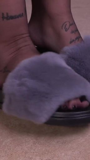 Insanely gorgeous Tokyo puts on her plush grey slippers