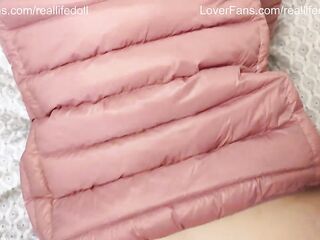POV screwing in pink down jacket and hunter boots