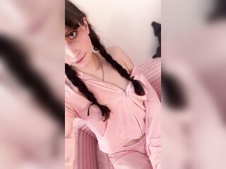 Cute trans hotty strokes ramrod in her wet couture tracksuit