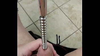 using a ribbed sounding rod down my cock again