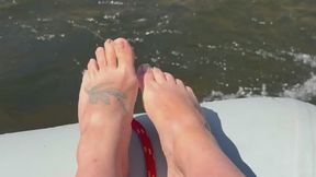 My Barefeet Get Splashed While White Water Rafting