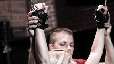 Submissive blonde is restrained and submitted to a hard stuffing and deepthroating