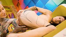 Tattooed lesbian gets deep fisted until she cums hard for real