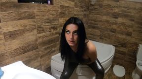 ripped shiny nylon jumpsuit in the bathroom. cum cleanup, dirty dancing and pee play