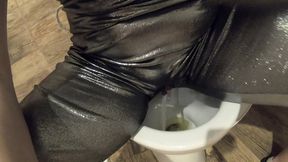 ripped shiny nylon jumpsuit in the bathroom. cum cleanup, dirty dancing and pee play