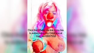 Goddess CLOWN blowing on a banana and having fun with her titties