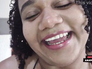 Ebony woman with a large booty and large bazookas giving her booty to a white stud.