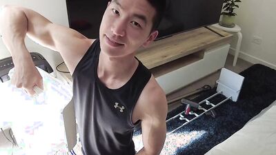 Fit young jocks with chiseled abs jerk each other off