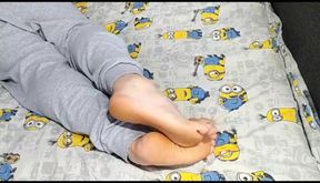 Stroking the Feet of the Feet and Applying Foot Cream to Herself