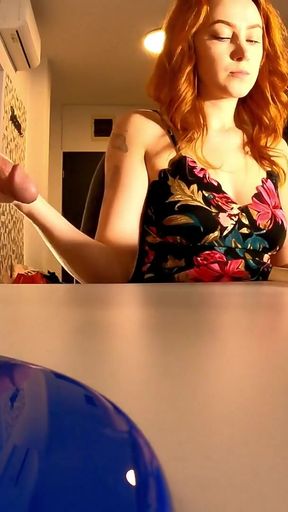 Super hot and cute beauty in a tight dress on the table gives a guy a handjob with cream   Clip 2