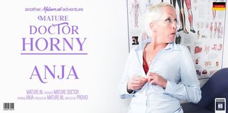 Mature Doctor Anja is alone at her practise and gets horny