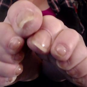 Closeup long real toenails
