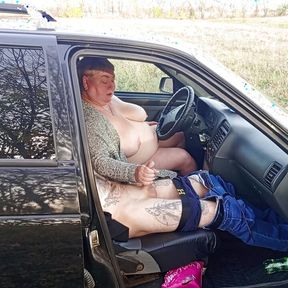 jerking off a dick in a car in nature