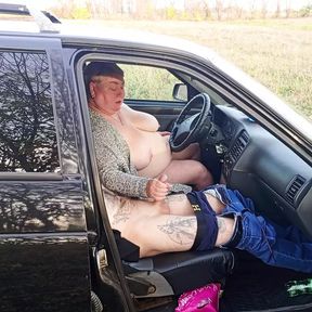 jerking off a dick in a car in nature