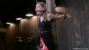 ”Gagged slave in red stockings whipped”