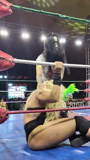 Busty latina shows off her phat booty in a wrestling match