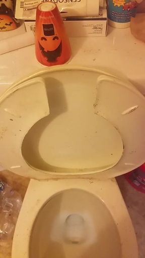 Peeing and cock play in bathroom.