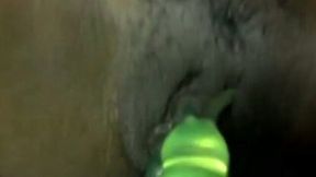 Dark skinned webcam nympho used green toy to tease her wet pussy