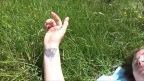 Amber masturbates in the fields