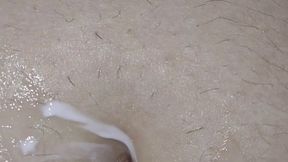 Belly button with body lotion and Qtip