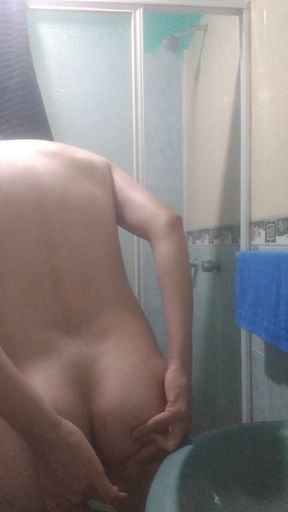 Man has fun before shower