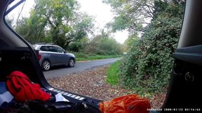 Just getting changed parked at side of road with cars driving past