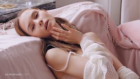 Beautiful brunette teen model Leona Mia teasing us and masturbating