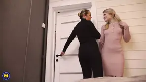 Beautiful mature mom spoiling teen stepdaughter