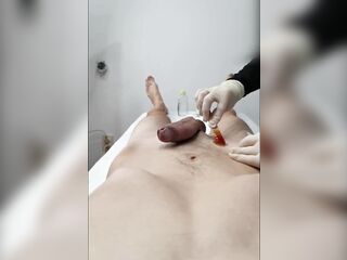 Depilation of a throbbing, swollen cock. The cosmetologist is confused.