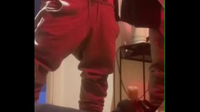 Amateur boy pissing in a glass held in his friend'_s mouth