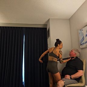 The principal had his belt put around his neck.