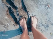 Tik Tok Topless girl walking on the public beach in wet sand