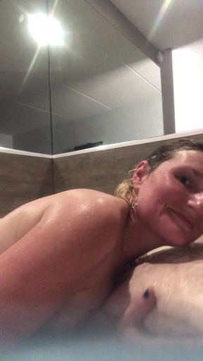 Flab fun in a jacuzzi! Slim n sexy Rachel Wriggler has slippy sliding soapy fun with a big chubby bear