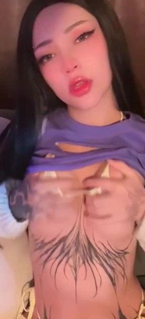Big-titted onlyfan shows off her ass