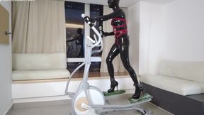 Mz27 - a Girl Bound in Latex Walks on a Treadmill