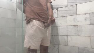 A rapid cum shot in the shower sans anyone watching!