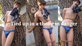 A boy tied to a tree MP4
