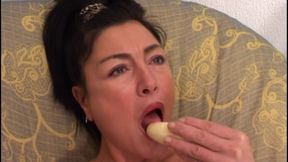 The Old Woman Masturbates with the Banana