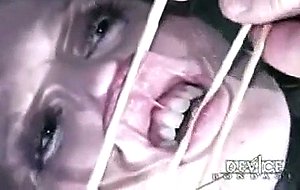 Sarah Jane Ceylon in medical straitjacket and latex bondage