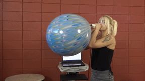 Abby Marie Blows a Suzuki Peacock Balloon to Bursting (MP4 - 720p)