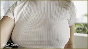 Busty MILF teases with bouncing boobs in public