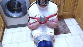 Miss M has a footballer duct taped on kitchen floor