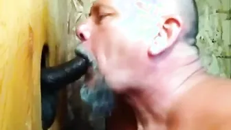 Curious Guy Sucks Big Black Cock at Glory Hole