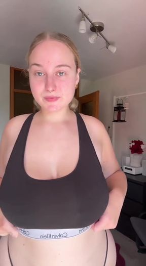 Amateur with big tits shows off her round ass