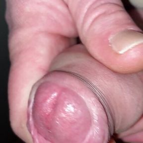 Close up edging tight foreskin with big cockhead