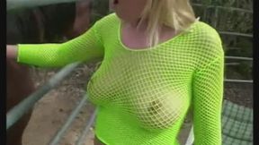 Sexy blonde with great natural boobs gags on a big dick then fucks in a corral