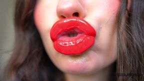 red sticky messy lipgloss layers and pouting kisses